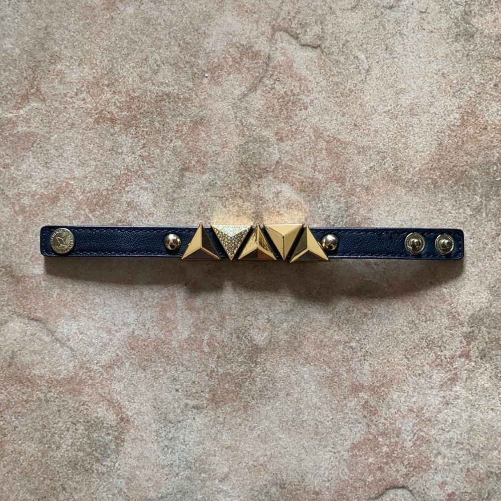 leather and gold metal bracelet